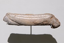 A spear thrower with an engraved fish made out of reindeer antler. Found in the Isturitz cave in France and dates to 19,000 to 14,000 years ago.